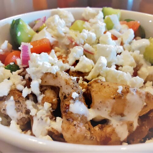 greek chicken and rice bowl with feta cheese